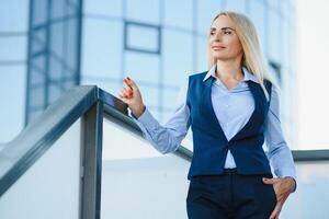 Business Women Style. Woman Going To Work. Portrait Of Beautiful Female In Stylish Office. photo