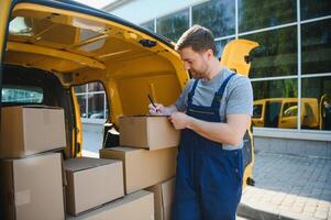 delivery service employee. Portrait of man working in delivery service photo