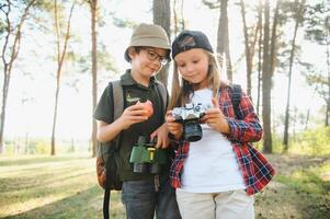 kids scouts in the forest. photo