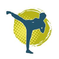 Silhouette of a male doing martial art kick pose. Silhouette of a martial art male doing kicking pose. vector