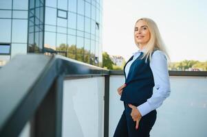 Portrait of business woman smiling outdoor photo