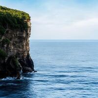 AI generated Beautiful seascape with cliffs on the coast of Bali, Indonesia photo