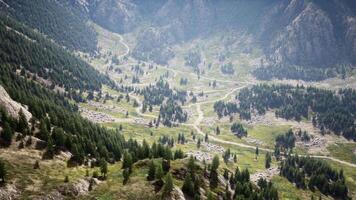 A serpentine mountain road surrounded by breathtaking scenery video