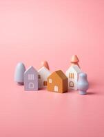 A small town made of figurines of houses. Urban projects and city development. Housing development, purchase and sale. Searching for a house to rent. photo