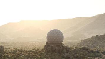 observatory dome standing tall in the middle of a vast desert landscape video