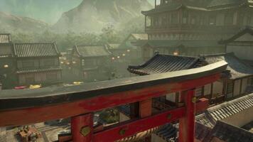 An oriental city with a red gate and mountains in the background video