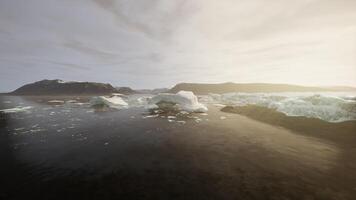 A mesmerizing view of floating icebergs on calm waters video