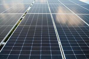 Solar Panels Against The Deep Blue Sky. photo