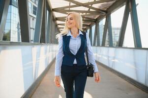 Portrait of business woman smiling outdoor photo