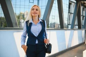 Business Women Style. Woman Going To Work. Portrait Of Beautiful Female In Stylish Office. photo