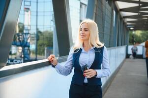 Portrait of business woman smiling outdoor photo