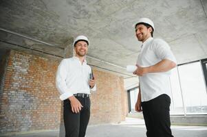 two business man construction site engineer. photo