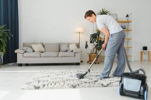 Middle-aged woman cleaning new apartment. photo