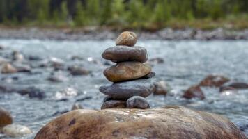 The arrangement of stone is back in the backdrop of a waterfall photo