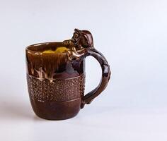 Ceramic mug with the head of a devil from the times of the USSR. photo