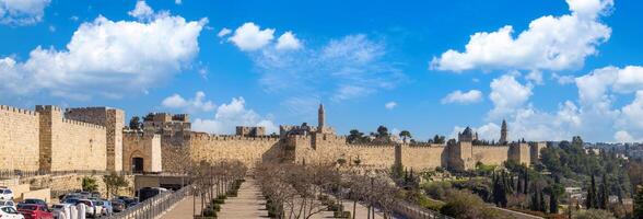 Israel, Panoramic skyline view of Jerusalem Old City in historic center with Tower of David in the background photo