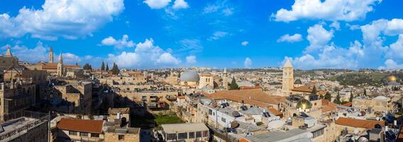 Israel, Panoramic skyline view of Jerusalem Old City in historic center with Tower of David in the background photo