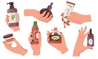 Cartoon hands with cosmetics. Woman hands with perfume and cosmetic bottles, woman care products flat style. Vector isolated set