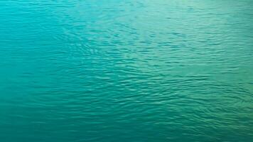 Background of the water surface of the Salzach river. Texture of water of a mountain river. photo