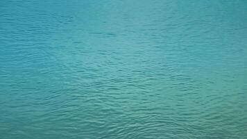 Background of the water surface of the Salzach river. Texture of water of a mountain river. photo