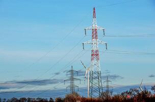 High voltage power lines along a road in Austria. photo