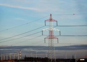 High voltage power lines along a road in Austria. photo