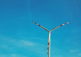 Wind farm park next to a road in Austria in sunny weather. photo