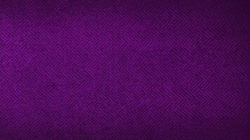 púrpura o Violeta espina de pescado modelo tela, textura antecedentes. Violeta tweed patrón, Costura, textil material. cerca arriba lona antecedentes. lujo concepto antecedentes. foto