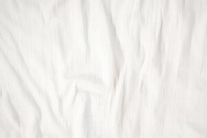 Fabric backdrop White linen canvas crumpled natural cotton fabric Natural handmade linen top view background Organic Eco textiles White Fabric texture photo