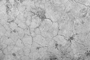 Aged cracked concrete stone plaster wall background and texture style photo