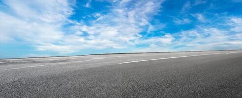 Empty highway road and sky clouds landscape,panoramic view photo