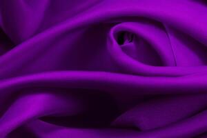 Purple fabric cloth texture for background and design art work, beautiful crumpled pattern of silk or linen. photo