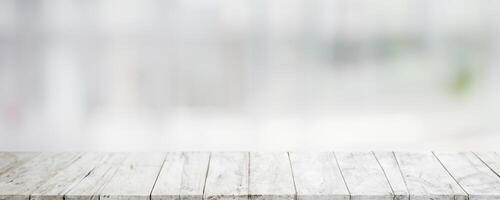 Empty wood table top and blur glass window wall building banner mock up abstract background - can used for display or montage your products. photo