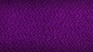 purple or violet herringbone pattern fabric, texture background. violet tweed pattern, weaving, textile material. close up canvas background. luxury concept background. photo