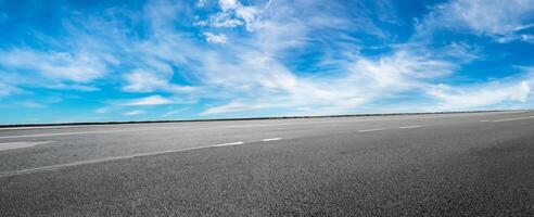 Empty highway road and sky clouds landscape,panoramic view photo