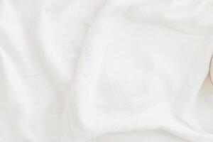 tela fondo blanco lino lona estropeado natural algodón tela natural lino parte superior ver antecedentes orgánico eco textiles blanco tela textura foto