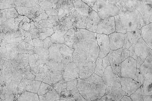 fondo de pared de yeso de piedra de hormigón agrietado envejecido y estilo de textura foto
