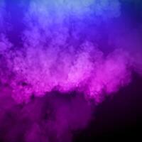 Purple and blue smoke on the black background. Colorful smoke isolated. photo