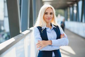 Portrait of business woman smiling outdoor photo