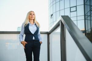 Business Women Style. Woman Going To Work. Portrait Of Beautiful Female In Stylish Office. photo