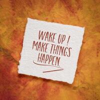 Wake up, make things happen - motivational note on art paper. photo