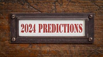2024 predictions - a label on grunge wooden file cabinet. Expectation and speculation for the incoming year. photo