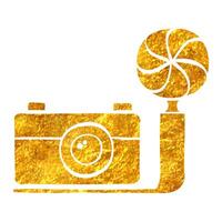 Hand drawn Old camera icon in gold foil texture vector illustration