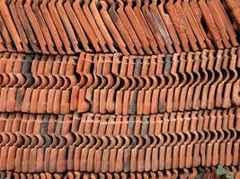 pile of roof tiles made of clay photo