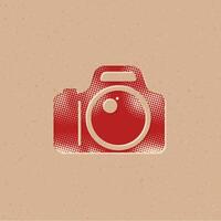 Camera halftone style icon with grunge background vector illustration