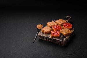 Delicious nutritious sandwiches with peanut butter, strawberry jam photo