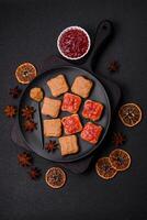 Delicious nutritious sandwiches with peanut butter, strawberry jam photo