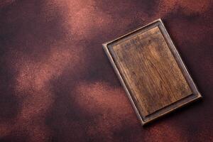 vacío rectangular de madera corte tablero en texturizado hormigón antecedentes foto