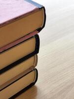 Old books. Stack of old books. Books on the table photo