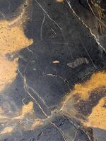 negro mármol con venas negro mármol textura. mármol antecedentes foto